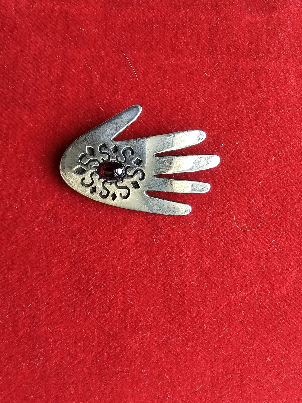 Navajo Crafted Sterling Silver Hand Motif Brooch with Red Stone Accent